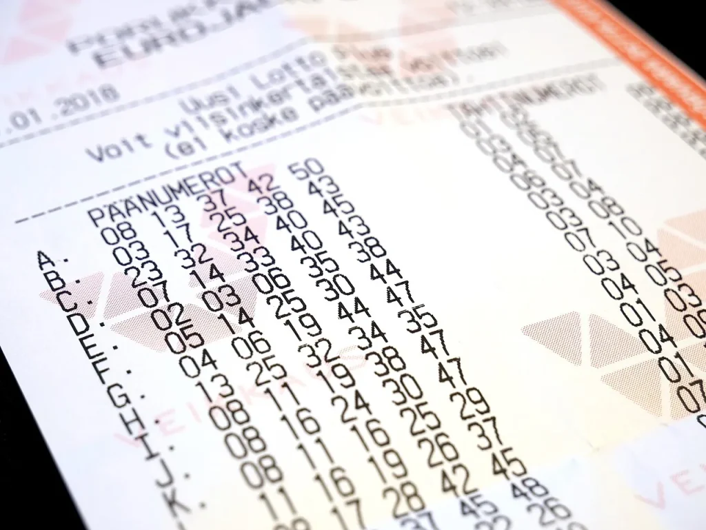 After the $562 Million Headline: Powerball Winnings and the Tax Reality Close-up of a printed lottery ticket with rows of chosen numbers