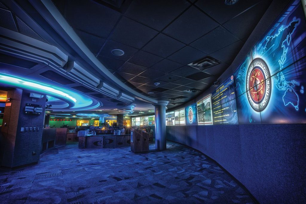 Analysts Take a Closer Role in Triaging AI-Flagged Alerts cybersecurity analyst monitoring multiple screens